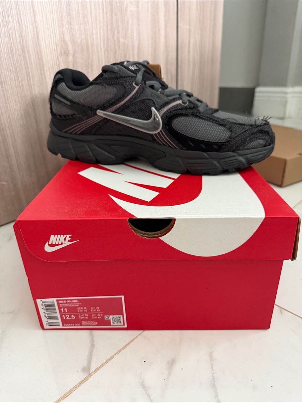 Nike Black Mens/Womens Mesh & Synthetic Sneakers with Silver Swoosh